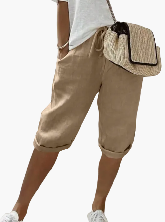 Modische Damen Caprihose in Leinen-Optik mit bequemem Kordelzug und Umschlag-Saum. Ideal für Sommer und Urlaub.