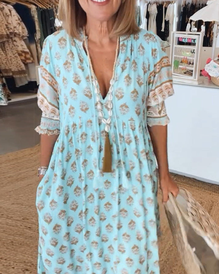 Grünes, elegantes Damen Sommerkleid Fleur. Leichtes Midi-Anlasskleid, fließend für stilvolle Sommerauftritte.