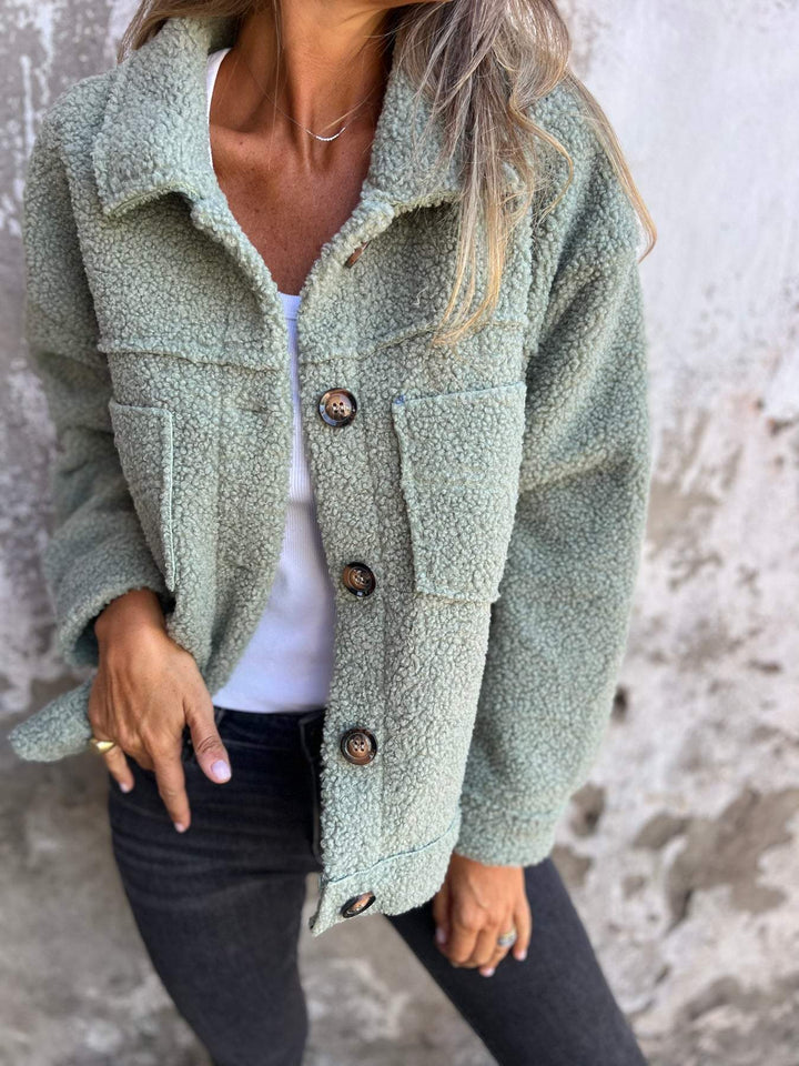Rosa Damen Herbstjacke mit dekorativen Knöpfen, langärmlige modische Übergangsjacke, ideal für Damenmode.