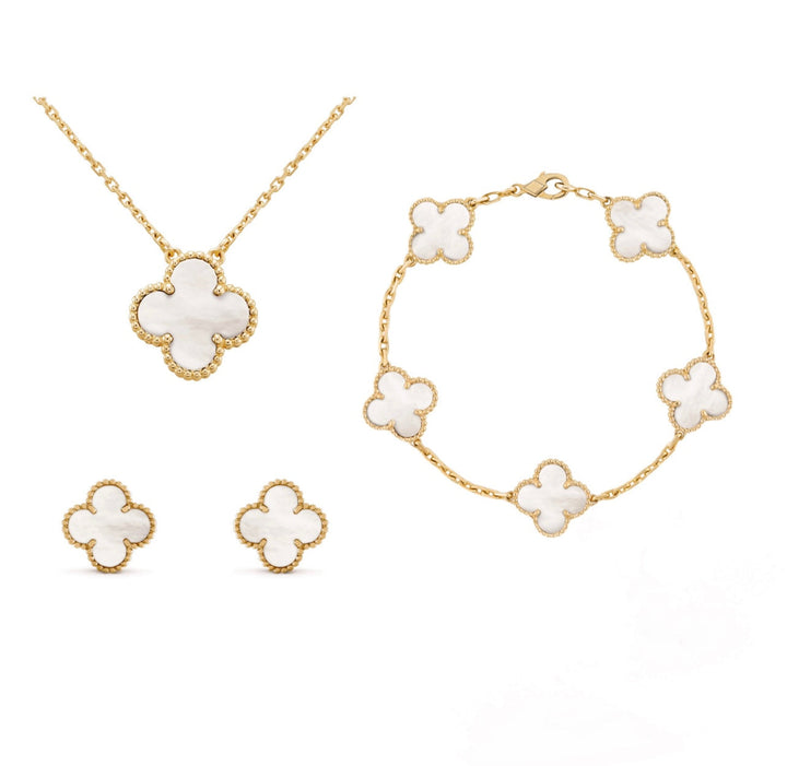 Stilvolles Damen Klaver Schmuckset Aurora: vergoldete Kleeblatt-Designs, zeitlose Eleganz & Glanz.