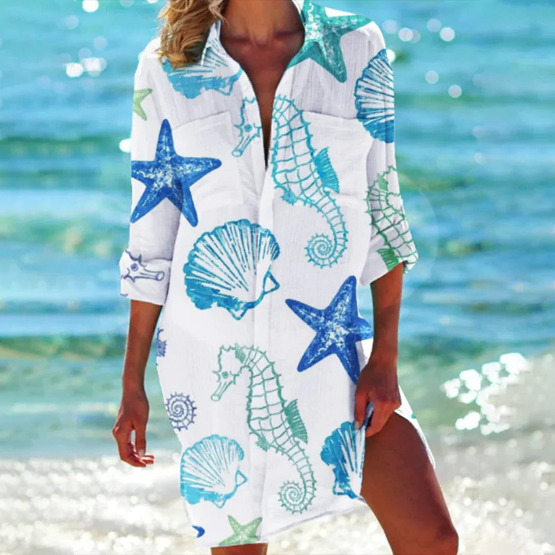Damen Hemdkleid mit lebhaftem tropischem Muster, als leichtes Sommerkleid für Strand und Stadt.