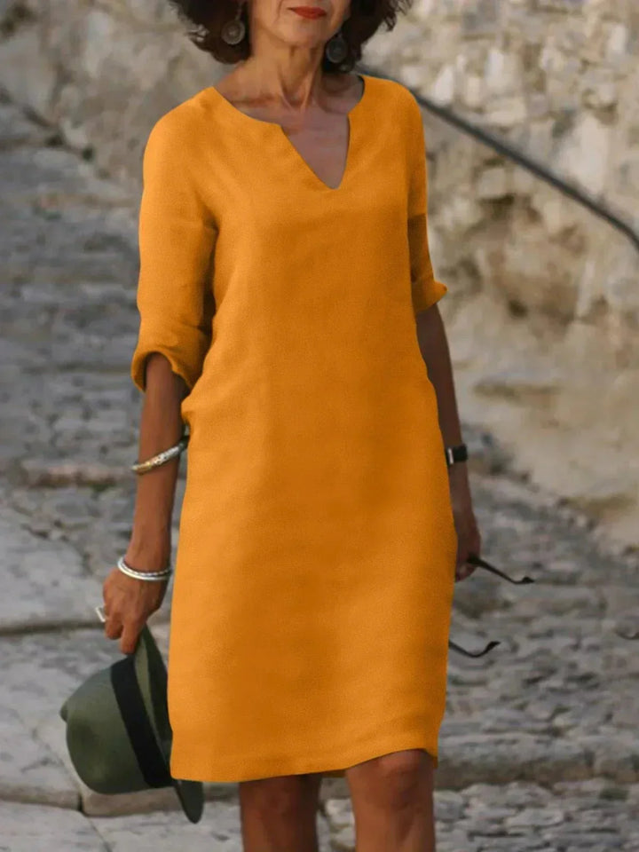 Modernes Damen Midi Kleid mit V-Ausschnitt, ideal für Freizeit und elegante Sommerlooks.