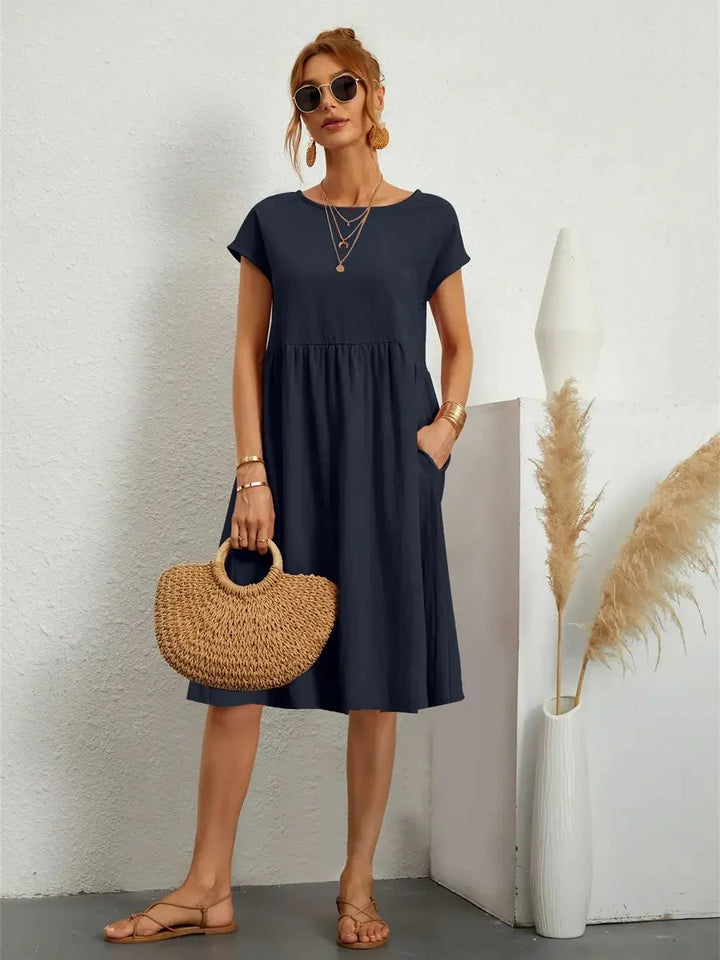 Fließendes Damen Smock Midi Kleid, schmeichelhaft für jede Figur. Sommerlich, elegant & bequem.