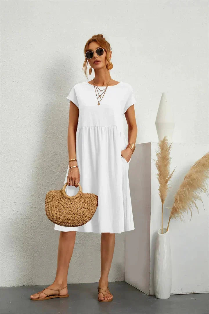 Modernes Damen Smock Midi Kleid, ideales Freizeitkleid für Sommer-Komfort. Trendige Damenmode.