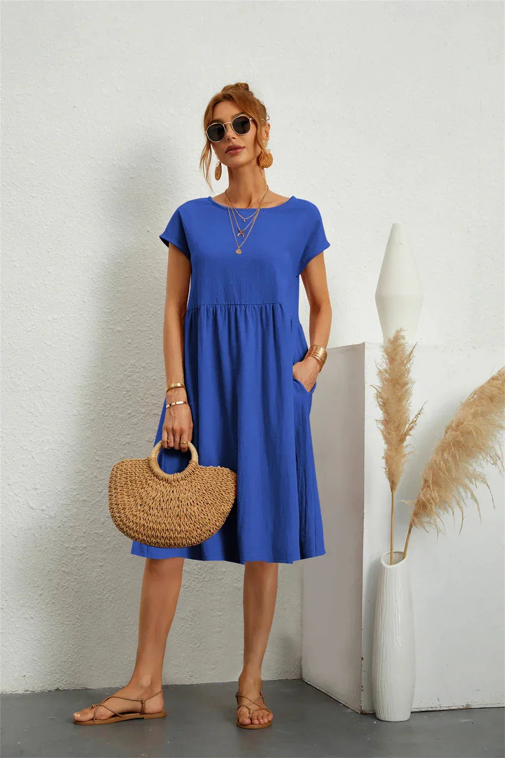 Damen Freizeitkleid, Smock Midi Schnitt. Perfekt für entspannte Sommertage. Bequem & modisch.