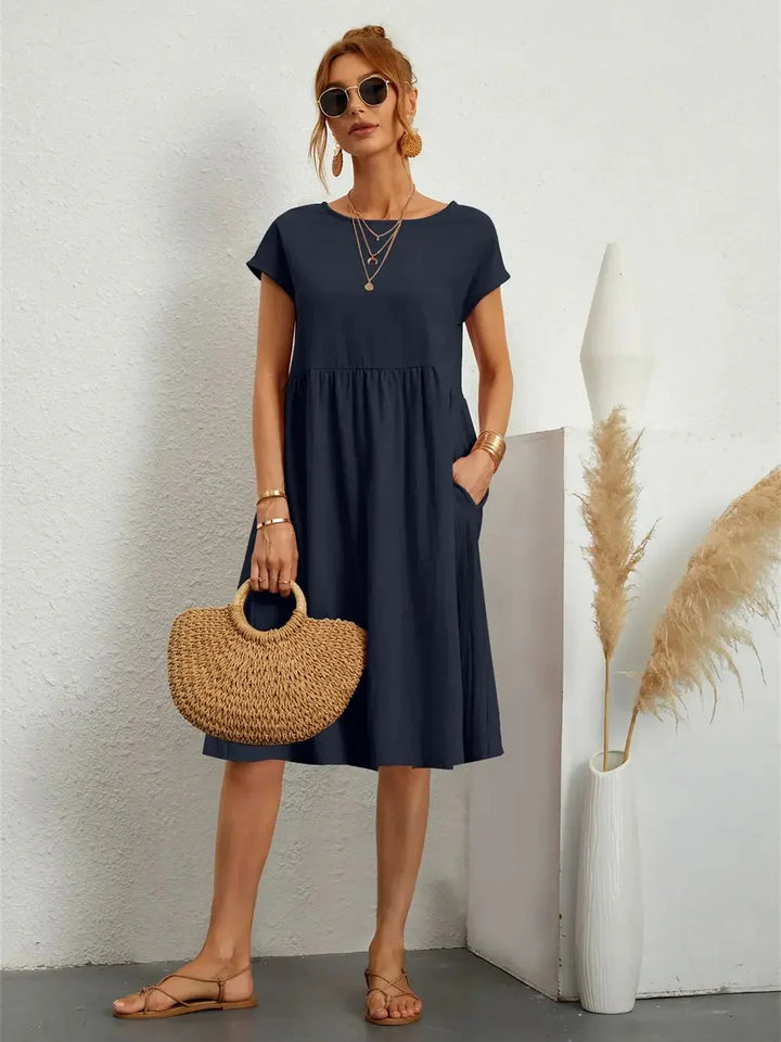 Komfortables Damen Smock Midi Kleid, atmungsaktiv für Alltag & Urlaub. Stilvolles Freizeitkleid.