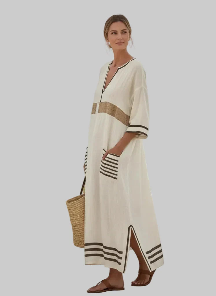 Gestreiftes Damen Maxikleid mit V-Ausschnitt & Taschen. Locker geschnitten, perfekt für Sommer & Freizeit.
