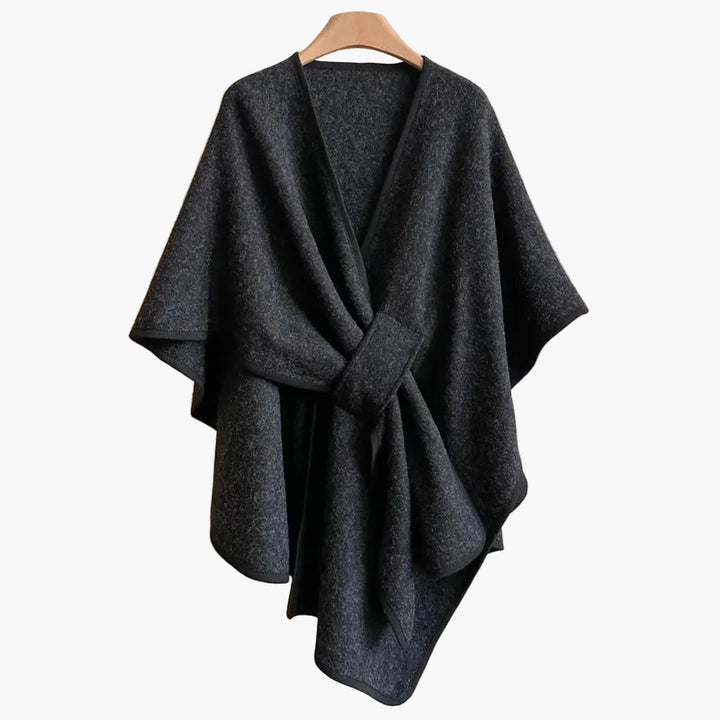 Stilvoller Damen Poncho-Schal für Herbst & Winter, hält warm & ist ein elegantes Statement-Accessoire.