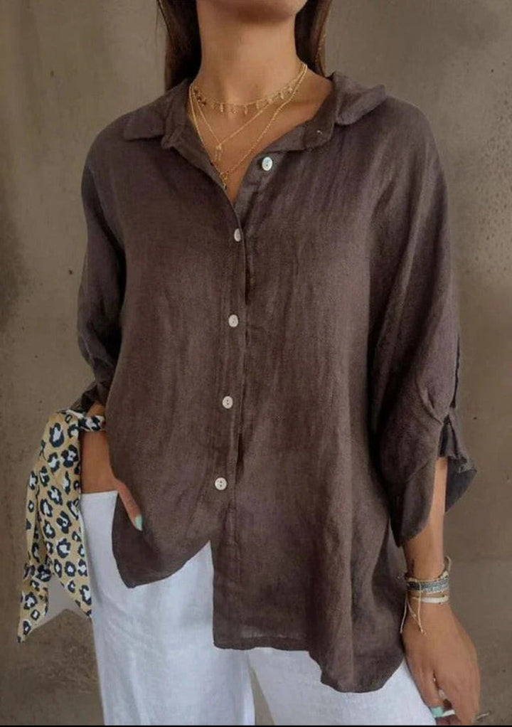 Damen Oversize Bluse "Lois Amsterdam" mit elegantem Schleifen-Rückendetail für den Sommer.