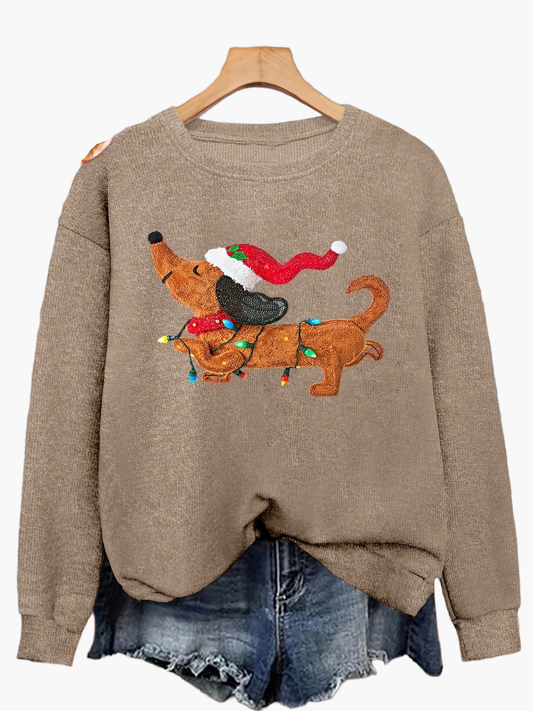 Eleganter Damenpullover mit festlichem Dackelmotiv. Perfekt als Weihnachtspullover oder stilvolles Winter-Outfit.