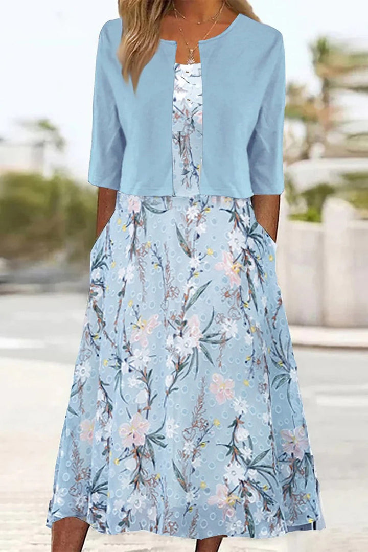 Elegantes Damen Midi Kleid Set mit floralem Design und passendem Cardigan für Freizeit und Frühling.