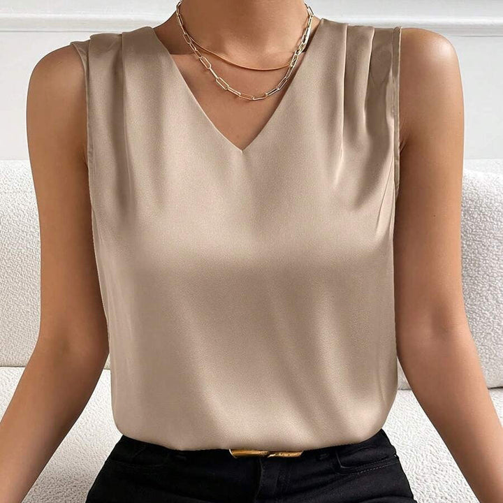 Damen Business Bluse, ärmellos, mit klassischem V-Ausschnitt, für einen eleganten Look.