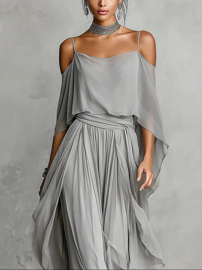 Komfortabler Damen Off-Shoulder Zweiteiler in Grau, mit schickem Top und Hose mit weitem Bein, vielseitig kombinierbar.