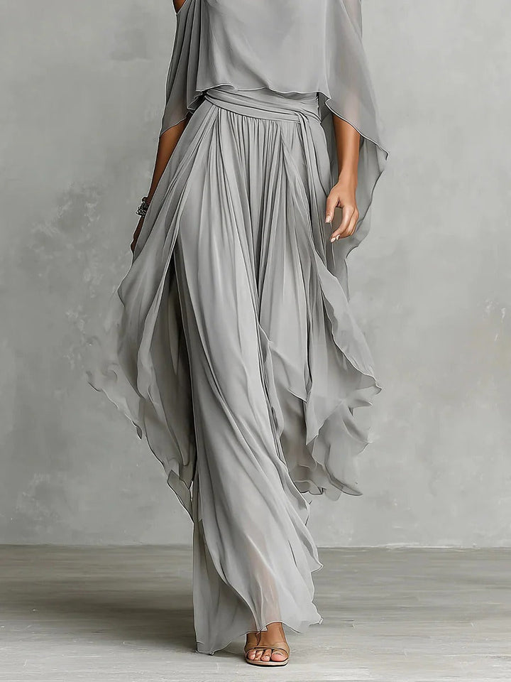 Stilvolles graues Off-Shoulder Damen Set mit weitem Bein. Perfekt als Freizeitoutfit oder schicke Abendmode für den Sommer.