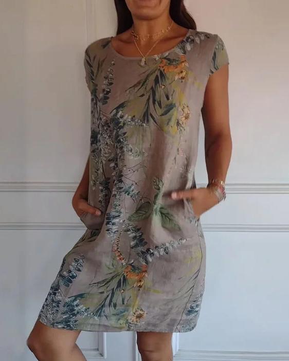 Freizeitkleid Damen, leichtes Material, V-Ausschnitt, Kurzarm und praktische Taschen für den Sommer.