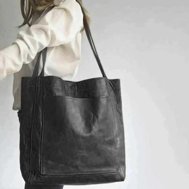 Stilvolle Damen Handtasche in Schwarz, ein unverzichtbares Accessoire für Frauen im Business & Freizeitbereich.