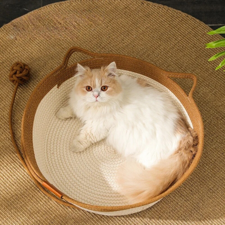 Gemütliches Katzenzubehör: grünes, handgewebtes Baumwoll-Katzenbett für Tierkomfort.