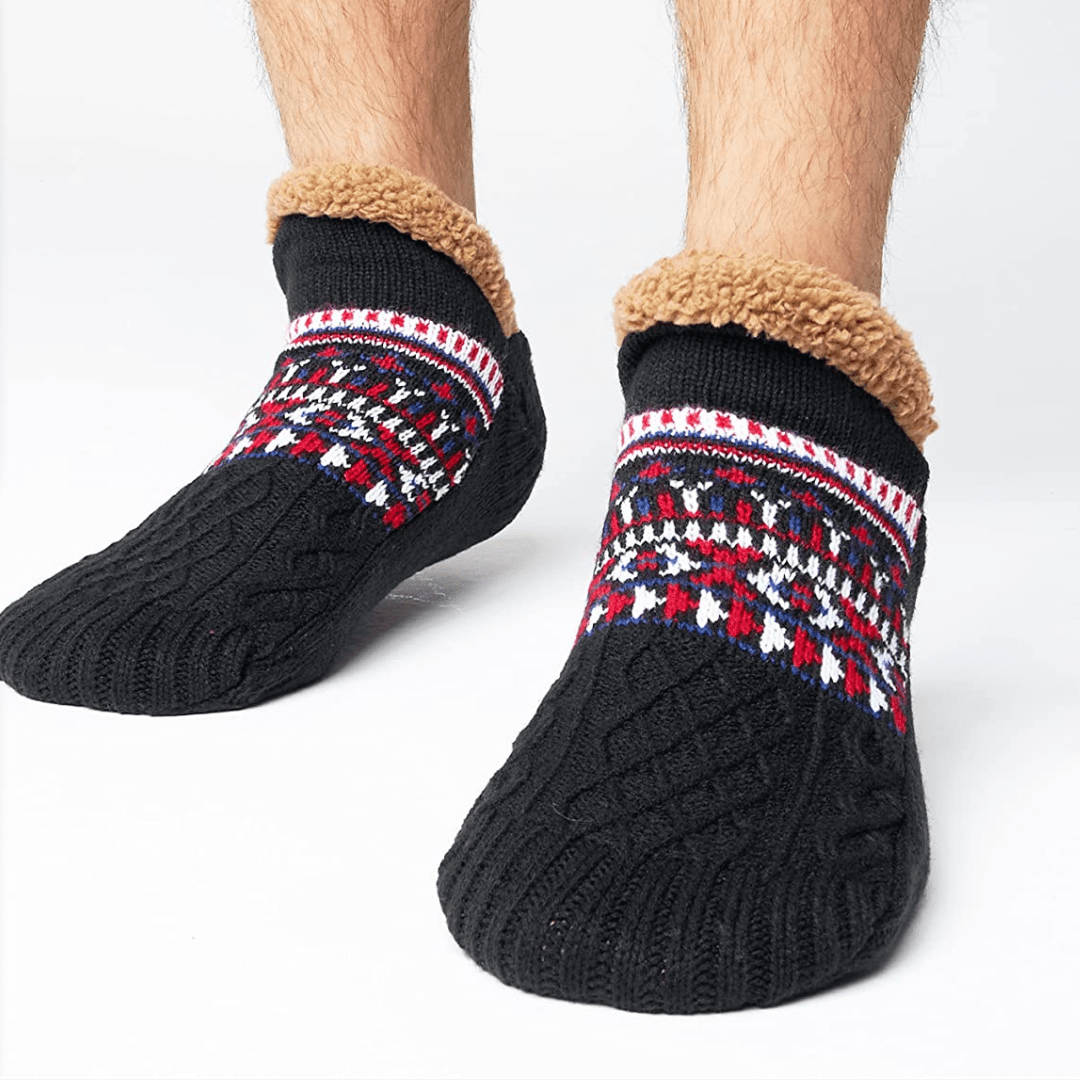 Dicke Winterstrümpfe (unisex). Warme, rutschfeste Kuschelsocken in Schwarz für gemütliche Abende.