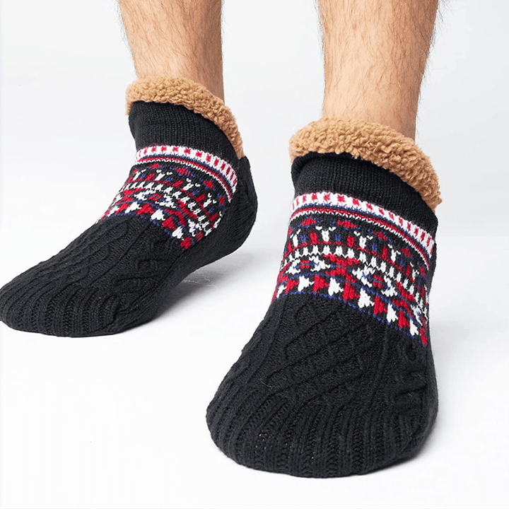 Dicke Winterstrümpfe (unisex). Warme, rutschfeste Kuschelsocken in Schwarz für gemütliche Abende.