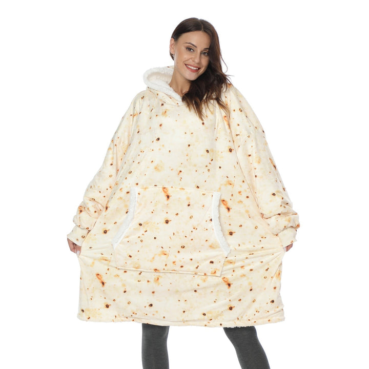 Flauschiger Kuschel-Pullover mit integrierter Decke, für maximale Gemütlichkeit.