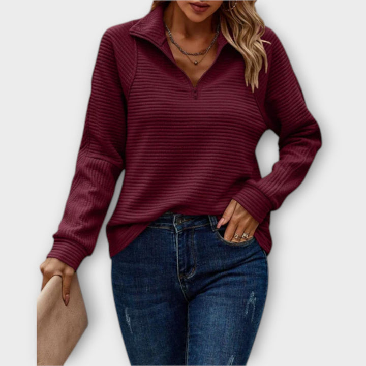 Lässiger Damenbekleidungs-Pullover aus Strick, mit V-Ausschnitt und Reißverschluss, für moderne Frauen.