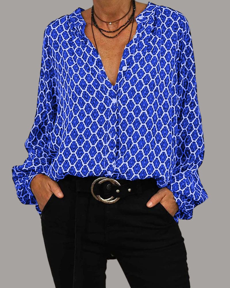 Elegantes Damen Oberteil mit V-Ausschnitt & geometrischem Design. Perfekt als modische Bluse für Büro & besondere Anlässe.