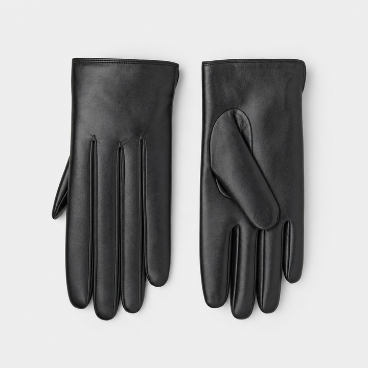 Elegante, schwarze Damen Handschuhe, schlank geschnitten. Stilvolles Winter-Accessoire für schicke Gipfelmode.