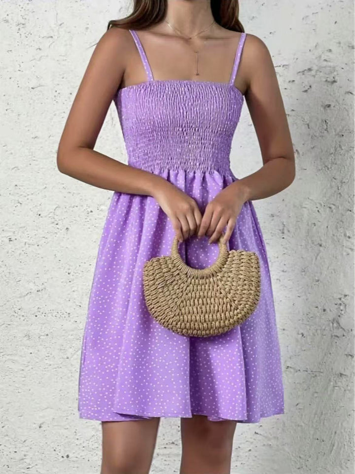 Damen Sommerkleid rückenfrei & gepunktet. Elegant, leicht & bequem, perfekt als Freizeit- oder festliches Sommeroutfit.