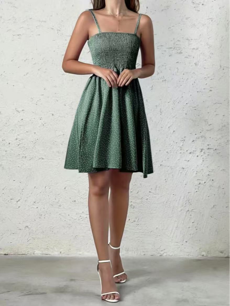 Fließendes Damen-Sommerkleid mit Punkten, rückenfrei. Elegant & luftig für warme Tage. Ein vielseitiges Freizeitkleid.