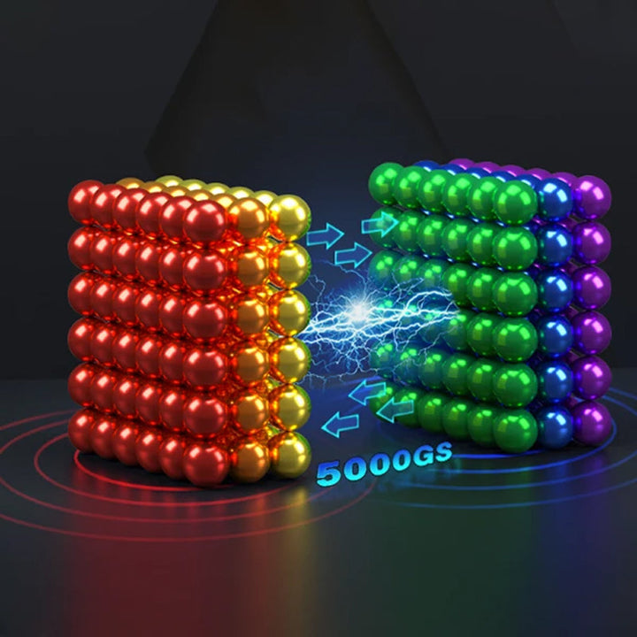 Nahaufnahme einer Hand, die ColorMagnet Magnetkugeln manipuliert, zur Förderung von Konzentration und Stressabbau.