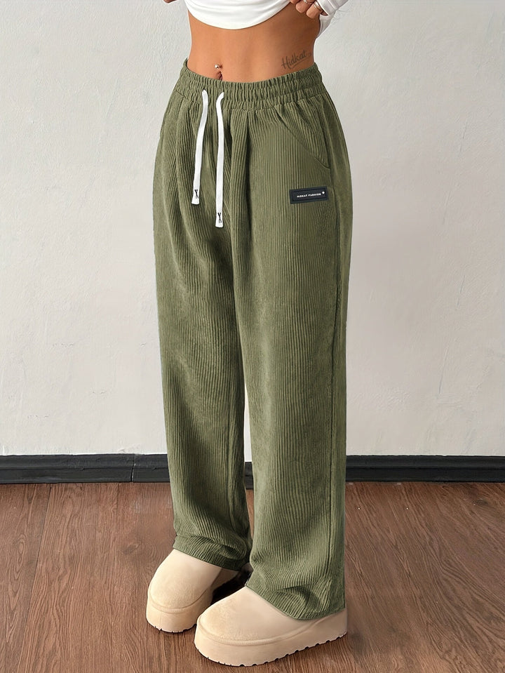 High-Waist Damen Joggerhose mit weitem Bein. Bequeme Passform, elastischer Bund. Perfekt als Freizeithose.