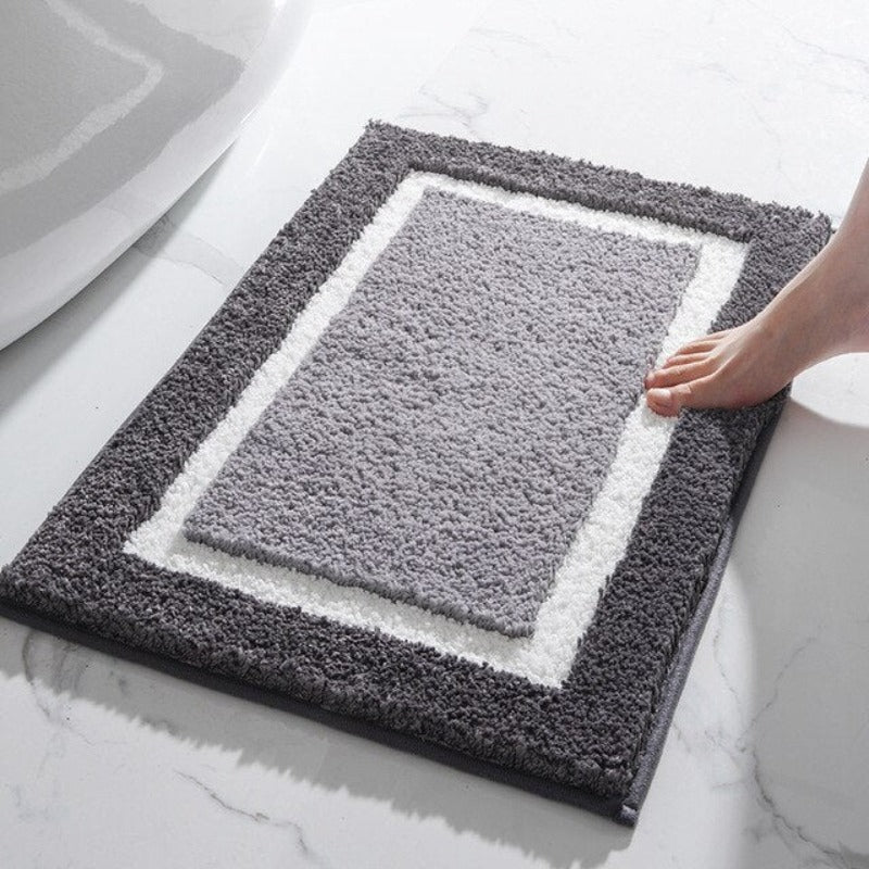 Rutschfeste Badematte für sicheres Badezimmer, weiche Mikrofaser, saugfähig & stilvoll, hoher Komfort.