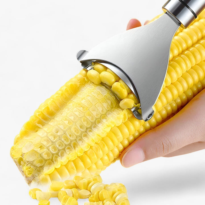 Ergonomischer Maiskornentferner aus Edelstahl, ideal für die Zubereitung von frischem Mais.