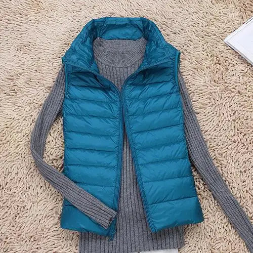 Stilvolle, leichte Damen Steppweste, warm & figurbetont. Perfekt als Übergangsjacke für Casual Mode & Freizeit.