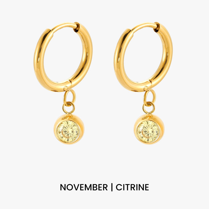 Personalisierte Damen Creolen Gold mit Geburtsstein. Zirkonia, wasserdicht & aus Edelstahl.