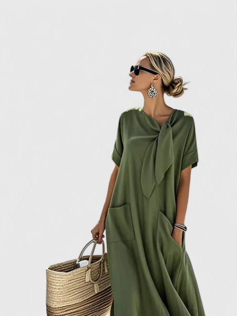 Leichtes Damen Sommerkleid mit V-Ausschnitt, bequemer Regular Fit & seitlichen Taschen, perfekt für den Sommer.