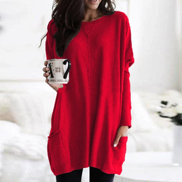 Eleganter Damen Pullover im langen Schnitt, vielseitig kombinierbar. Stilvolle Herbstmode für jede Frau.