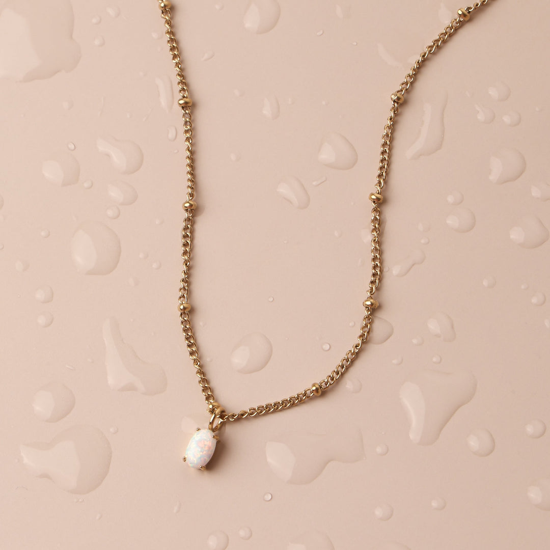 Zierliche Goldkette für Damen mit echtem Opal-Anhänger, perfektes hypoallergenes Geschenk.