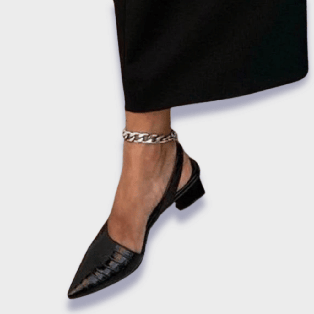 Bequeme orthopädische Damenschuhe in schwarzer Croco-Optik für Fußgesundheit und Eleganz.