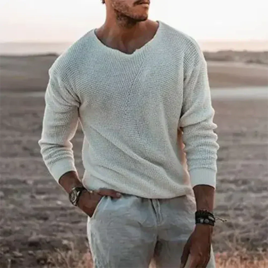 Nahaufnahme des gestrickten Materials vom warmen Herren Langarmpullover "Sigfried". Ideal für kalte Tage.