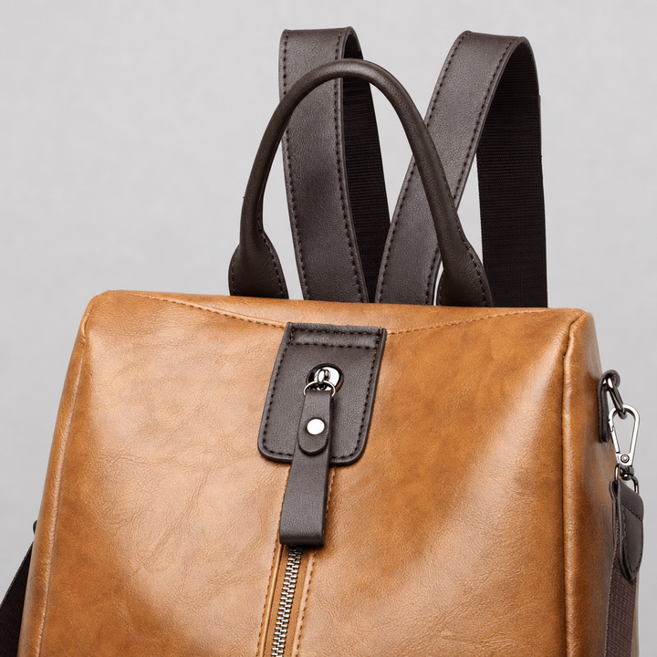 Eleganter Damen Wandelrucksack in Schwarz & Grün, aus Kunstleder, als Rucksack & Umhängetasche.