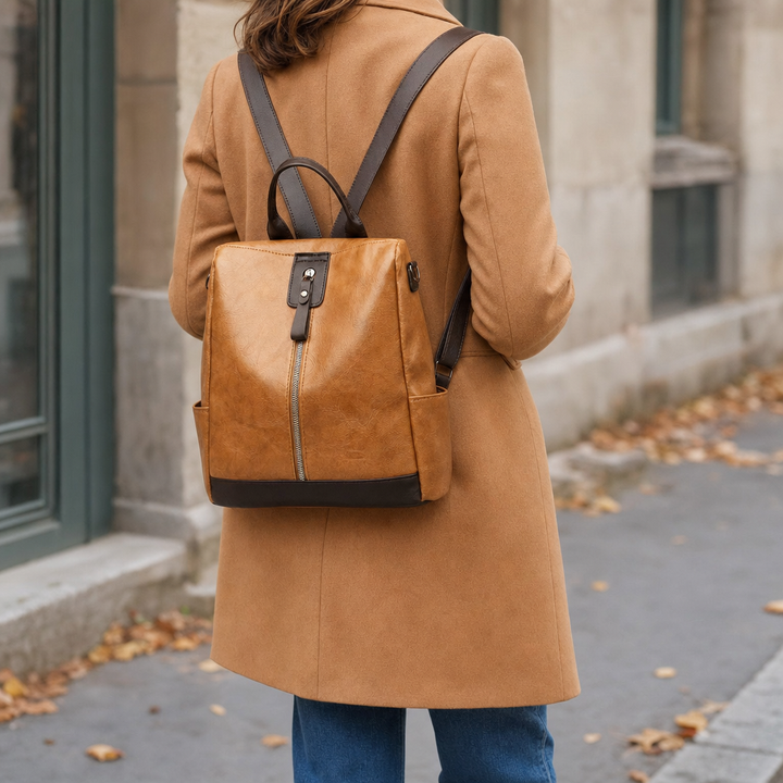 Sicherer Damen Rucksack aus braunem Kunstleder, vielseitig als Umhängetasche nutzbar.