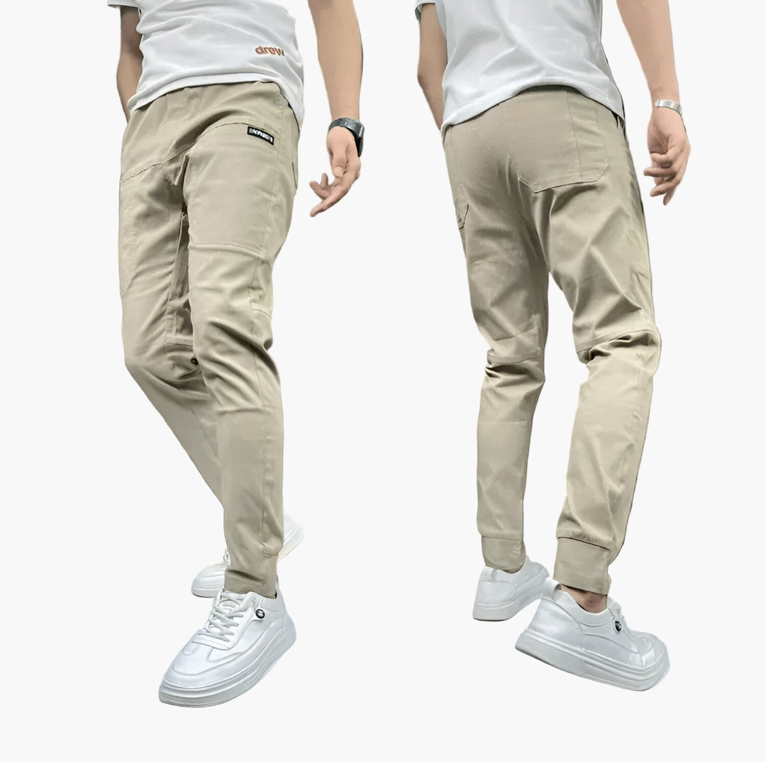 Dunkelgraue Herren Slim-Fit Sporthose, vielseitig für Sport und Alltag, bietet optimalen Tragekomfort.