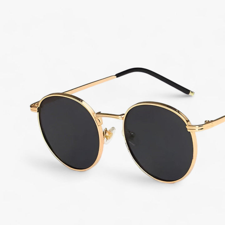 Elegante runde Unisex Sonnenbrille. Sommerlich, komfortabel und mit zuverlässigem UV-Schutz für alle.