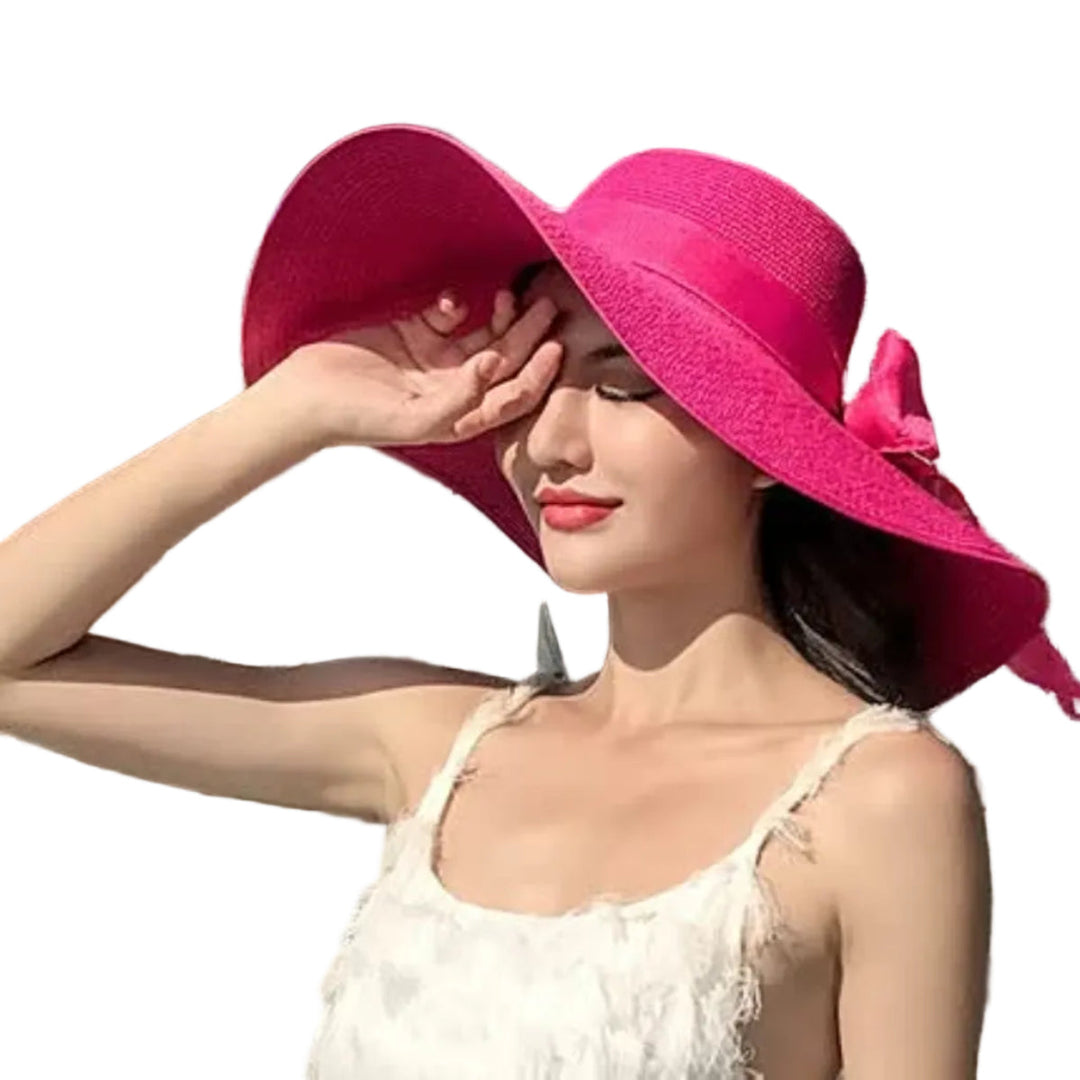 Eleganter Damen-Sommerhut mit großer Krempe, bietet optimalen UV-Schutz für Strandtage und Urlaubsreisen.