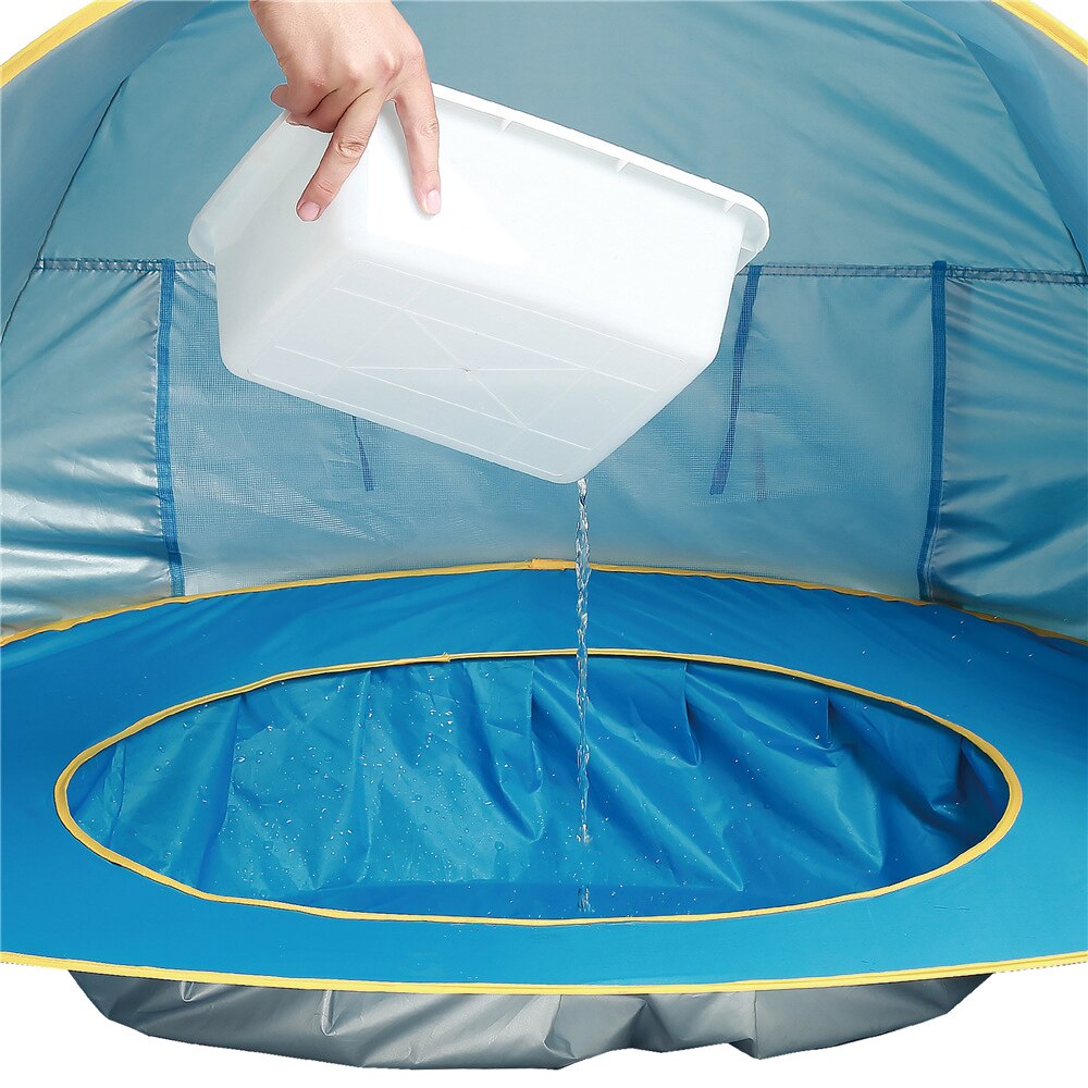 Leichtes Babyzelt mit Sonnenschutz und Planschbecken; ideal für Strandurlaub und Garten-Spiel.