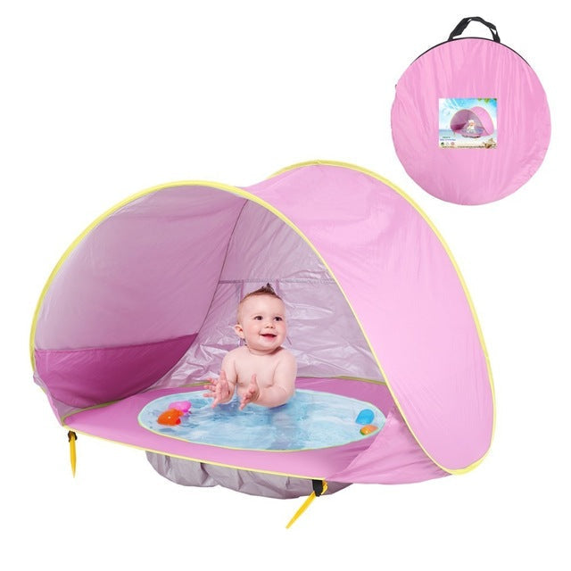 Kindgerechtes Reisezelt mit UV-Schutz und Planschbecken; ideal für Baby-Outdoor-Abenteuer.
