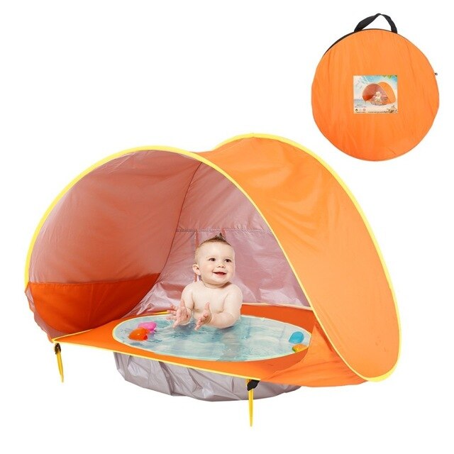 Kompaktes Strandzelt für Babys mit UV-Schutz und kleinem Planschbecken für den Sommer.