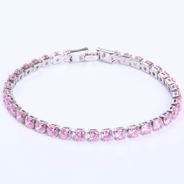 Exklusives Tennisarmband, Gliederkette besetzt mit glänzenden Zirkonia. Perfektes Accessoire.
