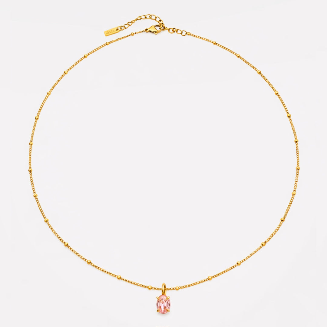 Detailansicht: Goldene Damen Halskette mit leuchtendem rosa CZ Anhänger aus hochwertigem Edelstahl.